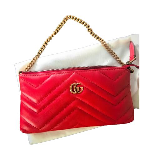 gucci red leather clutch bag|Gucci guccissima clutch.